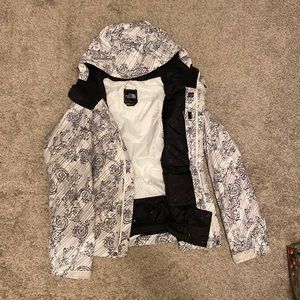 The North Face ski jacket. Fair condition. Hole and stain in liner as pictured.
